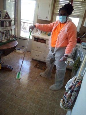 Sanitizing the wood floors!