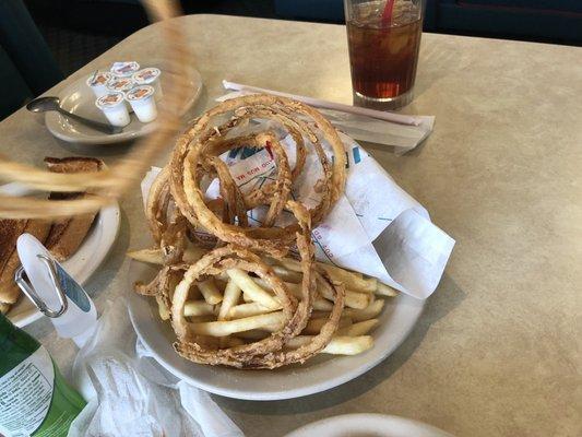 Sorry this was best pic of burger it didn't last long- ha! With split onion rings and fries