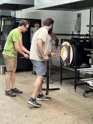 working the molten glass