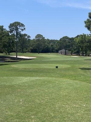 Par 3 6th. Bathroom facility just to the right of the green.