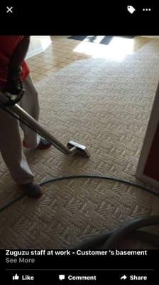 Zuguzu carpet cleaning technician at a customer home steam cleaning carpet