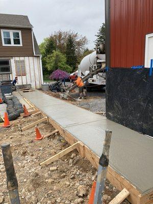 Pouring concrete for a breezeway