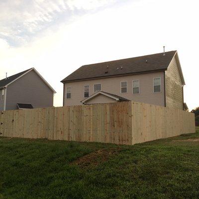 A 6 foot fence erected on Labor Day and a green mildew side of the house. Both reported in early September. No email or return calls.