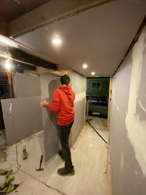 Hanging drywall and recessed lighting