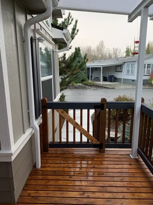 Water on deck from roof. Water dripping under shingles where the American Patio's awning was attached to roof causing a leak in roof.