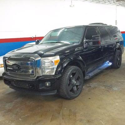 Ford excursion custom brought in for electrical repairs and engine replacement.