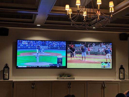 MLB game on the set on the left and the Charleston Riverdogs and Augusta Green Jackets (our game) in the right.