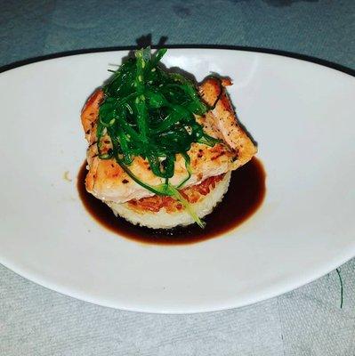 Pan Seared Salmon with Rice Cake, Wilted garlic Spinach, and Soy Sake Glaze