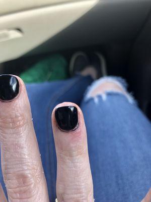 The bright pink spot is where she caught my cuticle in this finger with the filing machine. You can see the color pushed under my cuticles.