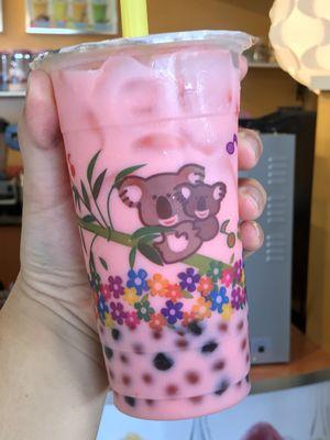 Strawberry bubble milk tea. With regular boba and strawberry popping boba