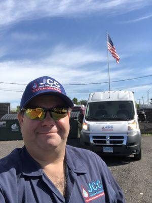 Joe Cote with the van in the background.