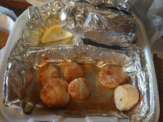 Broiled scallops. Tasty but thin and only came w ~9 for ~$16. Get much bigger scallops at whole foods. Came w baked potato and apple sauce