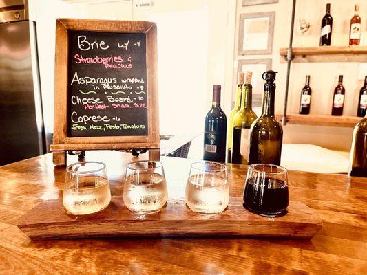 Wine flight and snack selection.