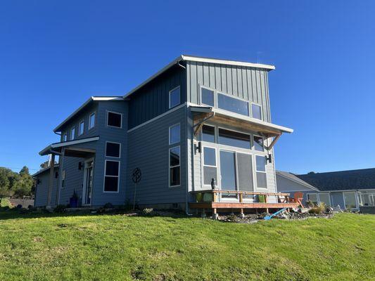 The back side of the house that looks out on the water-we had all the windows tinted here.