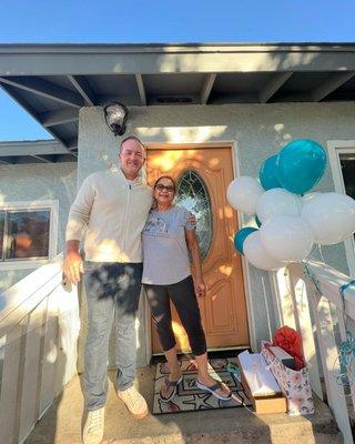 Sam May with new homeowner