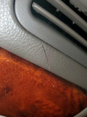 What looks to be a razor cut on my dash, the area it's in seems to be possibly accidental and unknowingly that it happened.