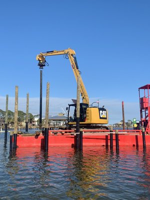 Driving pilings