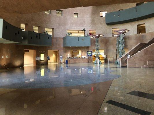 Main lobby on the first floor with the Security/ Information desk in the distance.