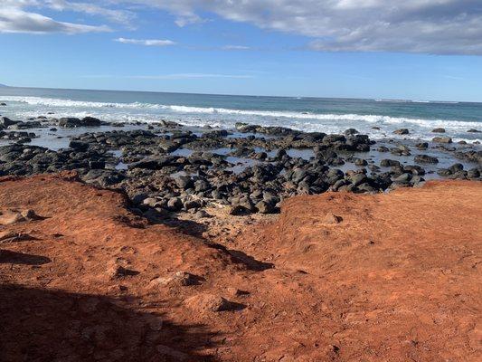 Red sand beach in Paia Maui