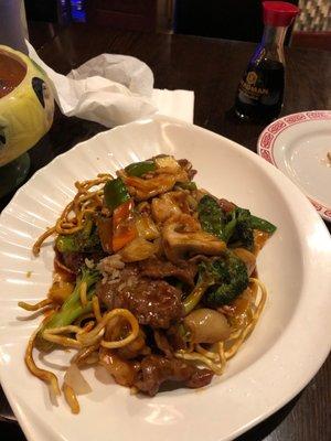 Pan fried noodle with beef, chicken, shrimp. So good and crunchy.