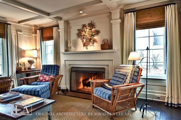 Living room with fireplace in Saugatuck, Michigan residence. Design by Jonathan Lee Architects. #jlaarch