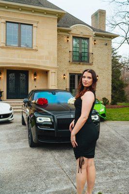 A model infront of our Rolls Royce Ghost, Lamborghini Huracan EVO, and Ferrari Portofino.