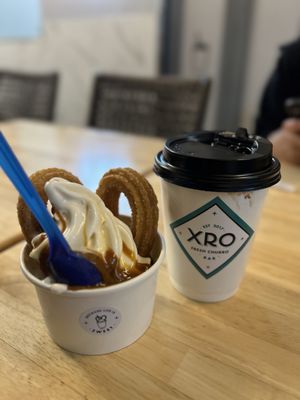 Vanilla Soft Serve, served w/ 2 Churros & Dulce de Leche drizzle and a Mexican Hot Chocolate pictured here