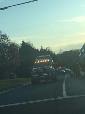 Police officers car being towed after rear ending another vehicle. Was traveling in excess of 70mph