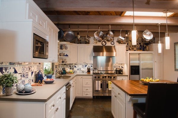 2019 Kitchen remodel - new drawer & door fronts, new Italian faux concrete counter-top to coordinate with existing slate floor.