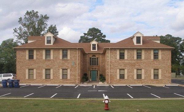 This is what the front of my building looks like.  You may park up front and walk in through the front lobby.   My Suite is to the left.