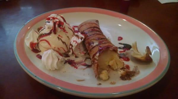 A fried dessert filled with cheesecake, apparently a recent addition to the menu.