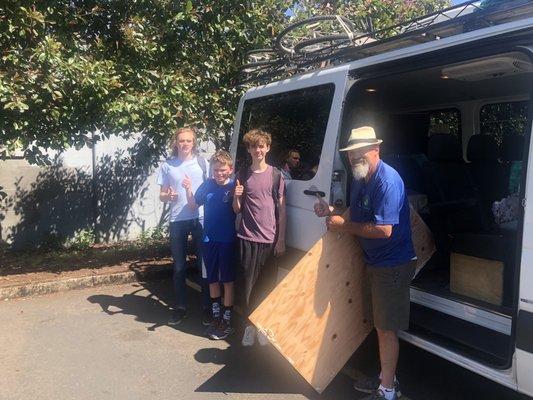 Repaired window and happy husband and kids.