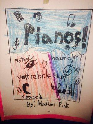 Student excited about piano drew this for the cover of her piano folder.