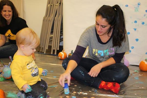 One of our teachers exploring sponge painting with a student