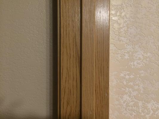 An excellent example of the texture matching that had to be done. Old on the left, re-finish on the right. New drywall on right.