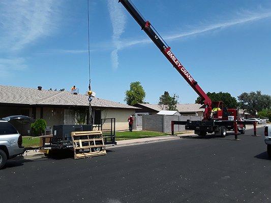 Crane Truck getting ready to life up my New 3 Ton 16 SEER Goodman Packaged Heat Pump.