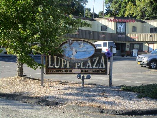 Once you pull into Lupi Court you will see the Lupi Plaza sign - We are to the right of this sign.