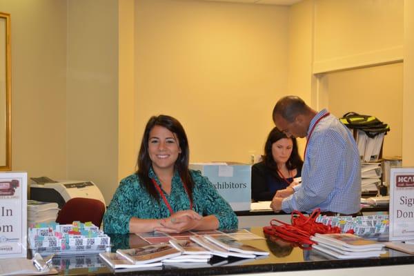 Toni Nolan welcoming HCAF Conference participants at registration.