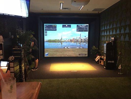 Golf simulator and drinks!