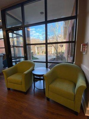 Enjoy the blue skies next to the wall of windows overlooking the expansive backyard.