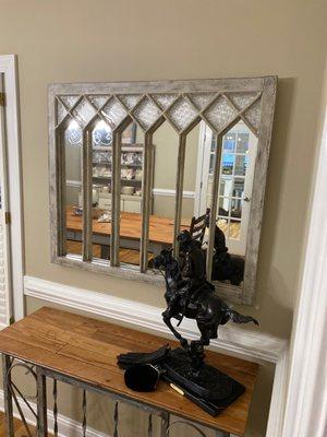 Decorative mirror from a re-purposed church window