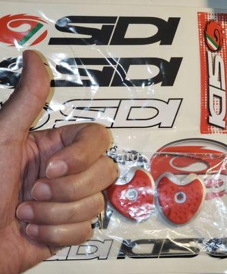 Thumbs up with Sidi cycling shoe parts.