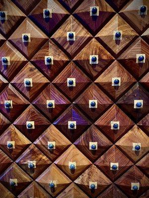 Detail of the large wood guest entry door to the chapel/church.