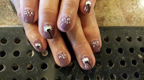 Gel polish over natural nail with hand painted dandelions