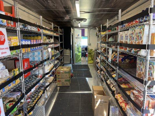 Inside view of the Mobile Food pantry. There is even a refrigerated section! Like a store on wheels!