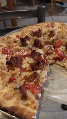 Clam pizza. Tons of fresh clams, roasted red peppers, bacon and garlic. Wow!