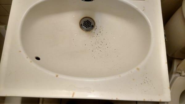 blackened burn cracks/marks in the sink