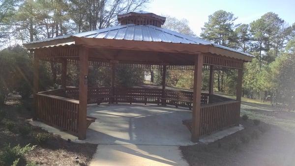 A gazebo with additional seating.