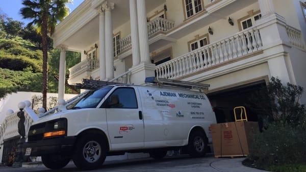 AMC van at residential system installation site in Beverly Hills.