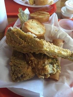 Mullet platter with fried rice and roll. Hot and flavorful